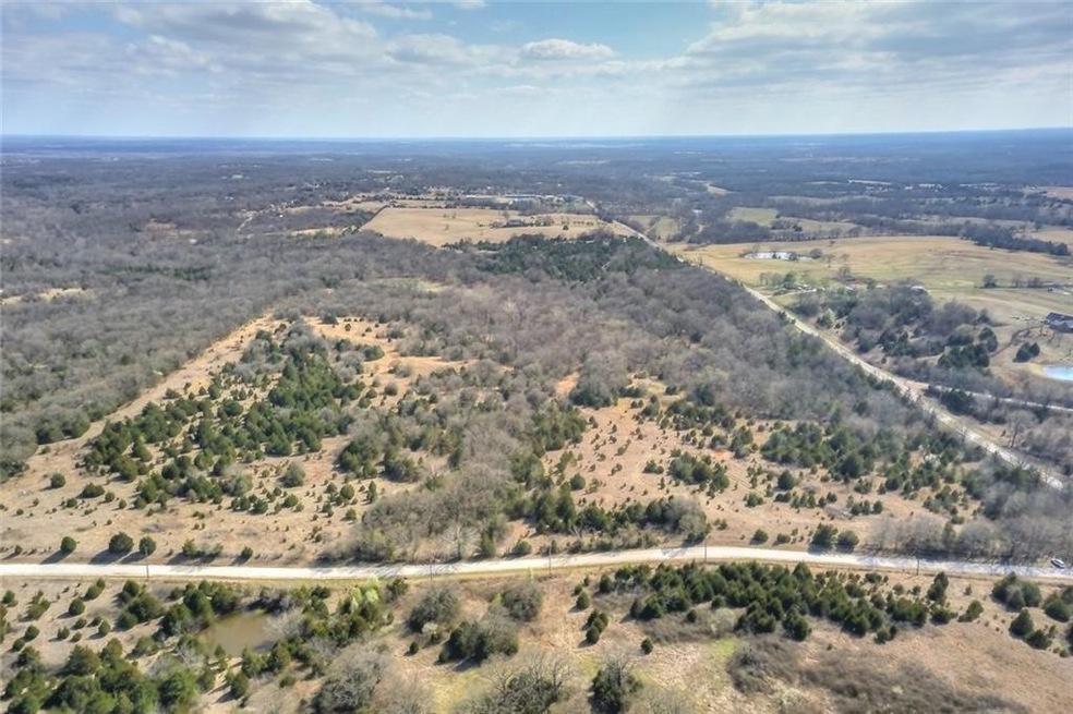 Bob Crouch in foreground,  S. Rock Creek Rd on rig