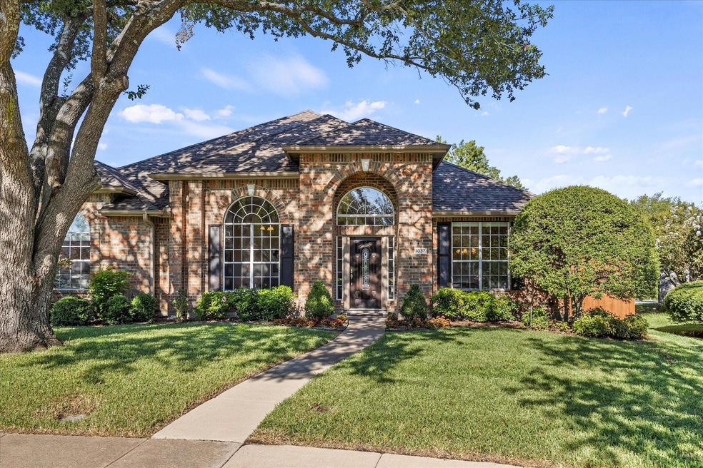 Lushly landscaped lawn welcomes your arrival!