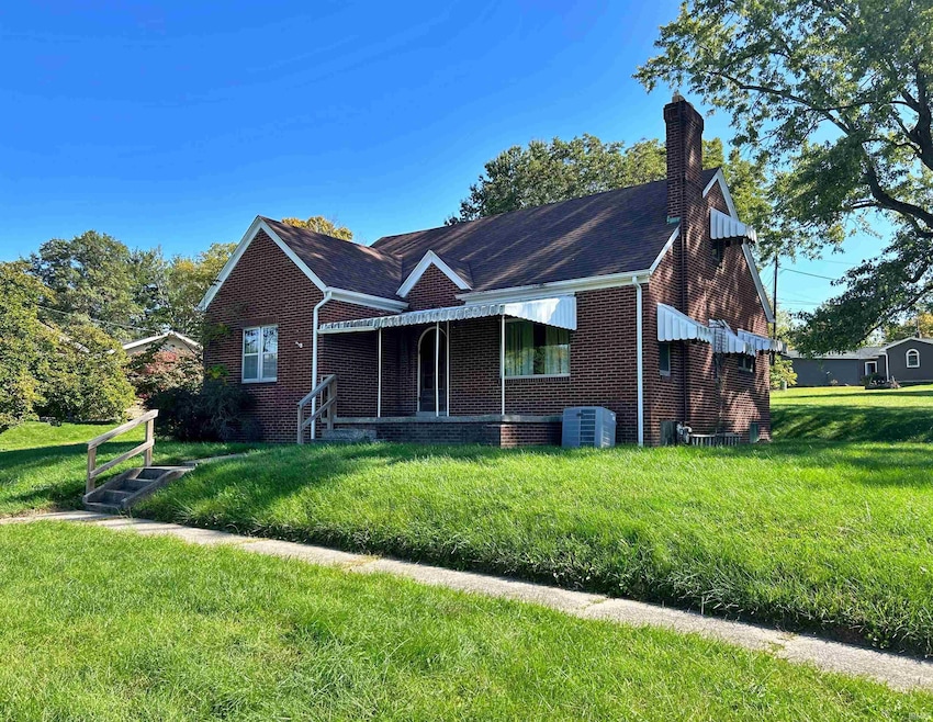 512 E Broadway St, Loogootee, IN 47553 - photo 1