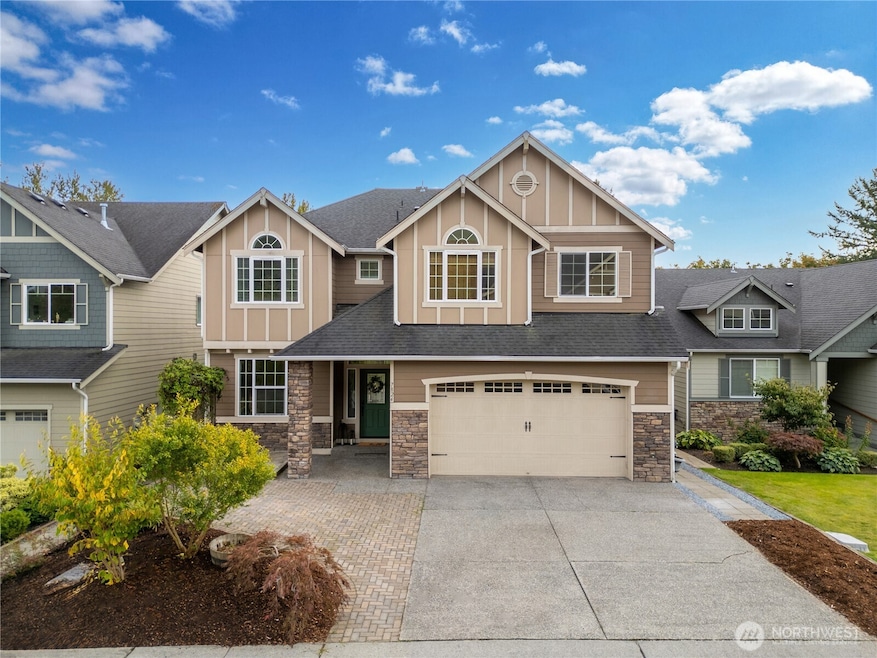 3 car tandem garage, extra added cobblestone parking.