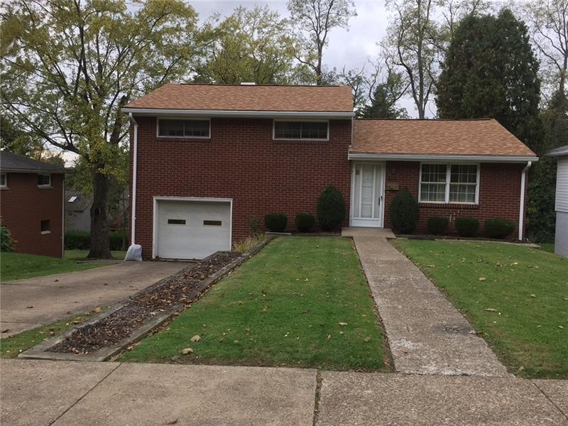 WELCOME HOME to this beautiful all brick multi lev