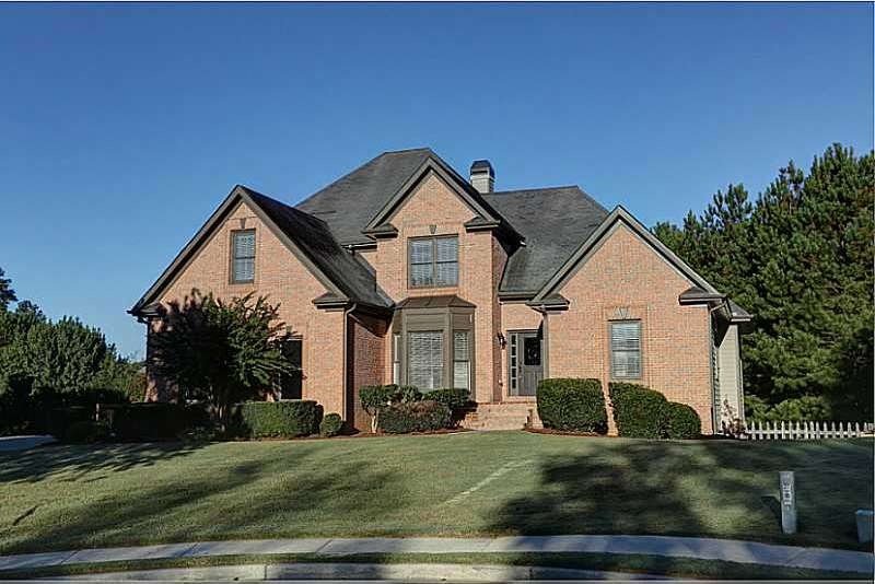Exterior Front. This brick beauty is located on a 