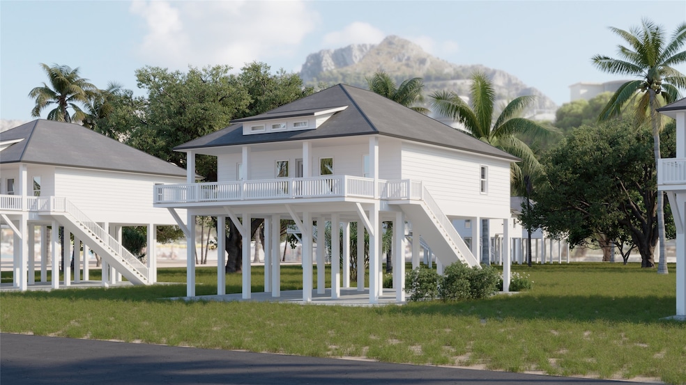 This photo showcases a charming elevated beach hou