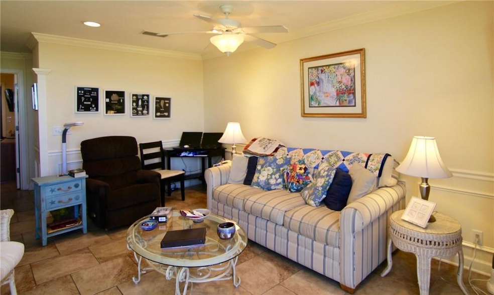 Living Room Love the tile flooring, wainscoting an
