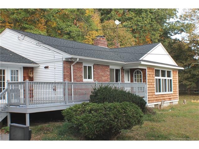 FRONT OF HOUSE WITH FRONT PORCH FRENCH DOORS LEAD 