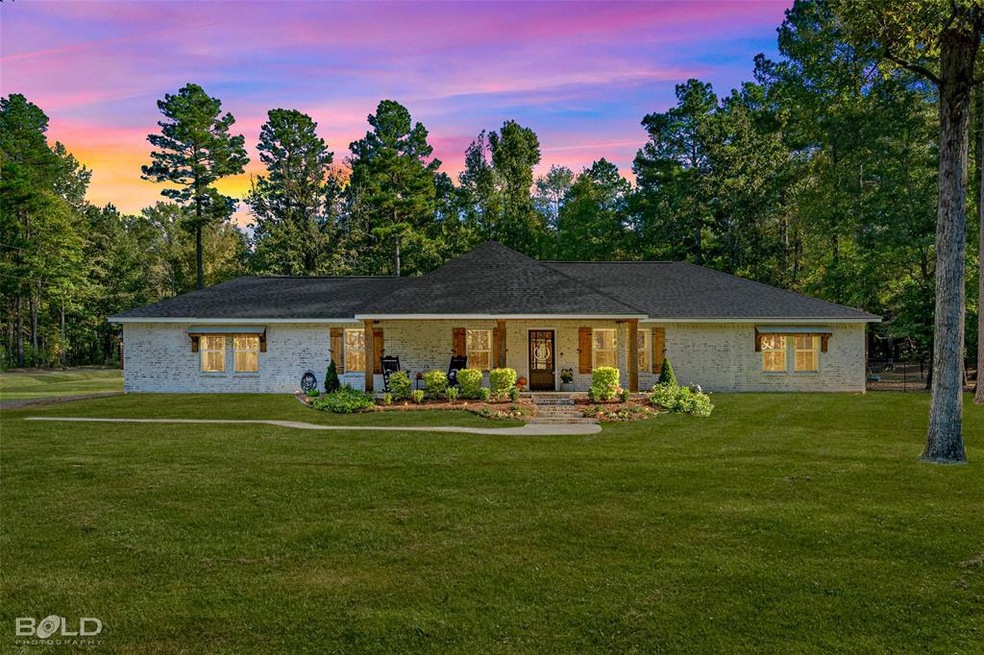 Home looks directly at Cypress Bayou