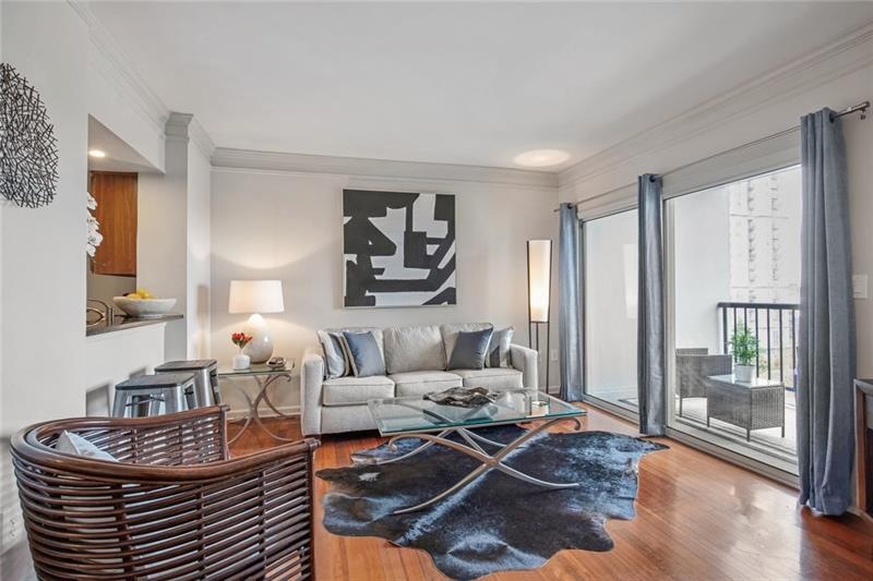 This open concept one bedroom floorpan has hardwoo