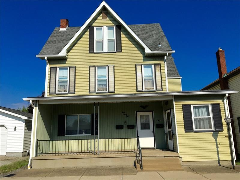 Street view.  Newer Roof!  White door leads to foy