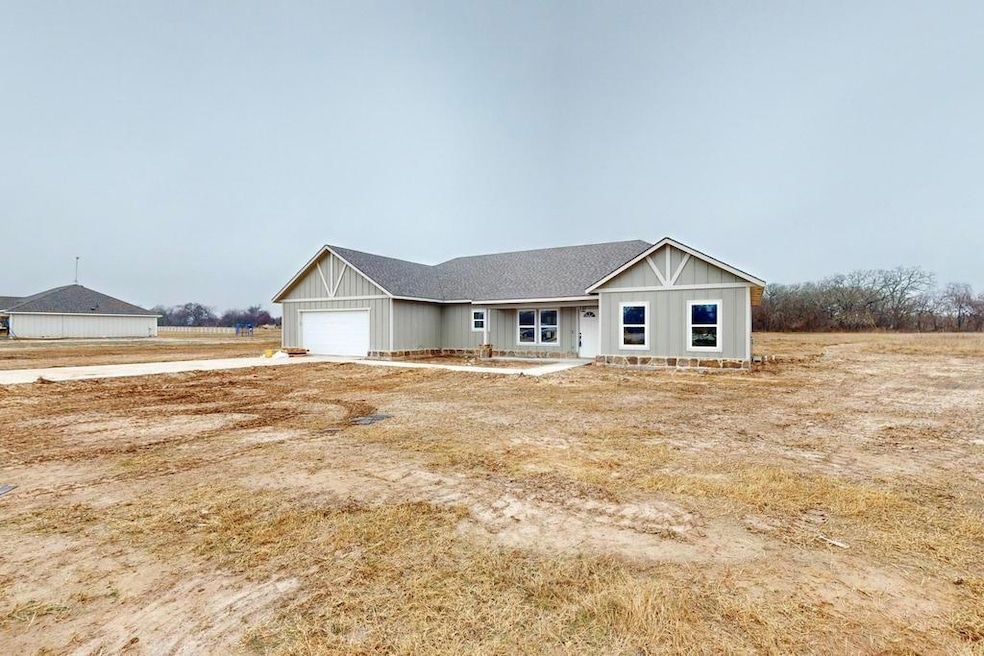 View of front of house with an attached garage