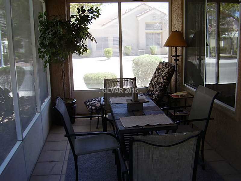 Exterior Back. Enclosed back porch.