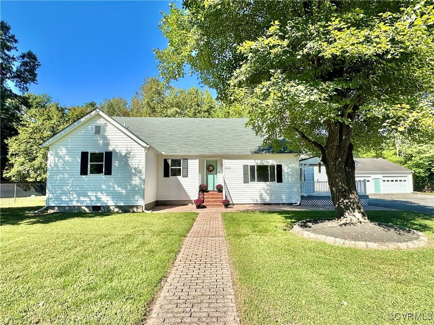 Ranch-style home with a front lawn