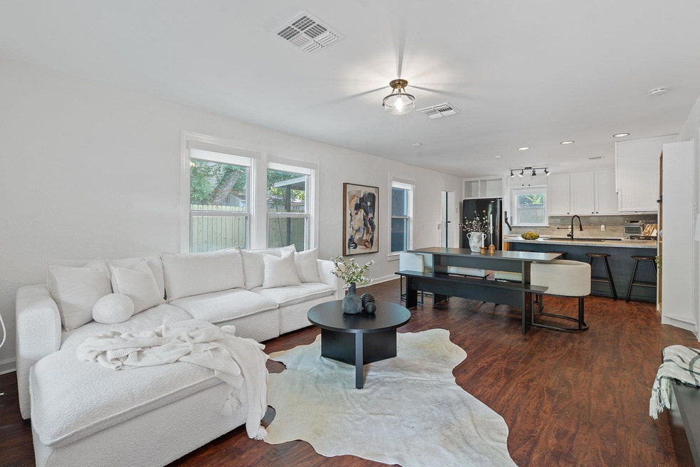 Living room featuring dark wood finished floors a