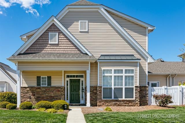 Front View, Landscaping included in HOA, 2 car gar