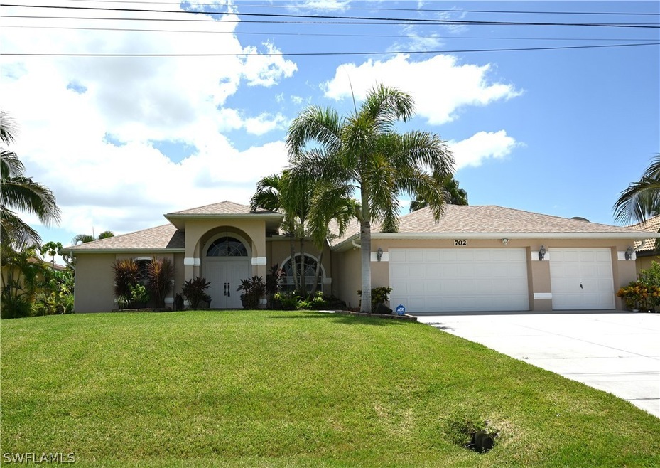 702 NE 20th St, Cape Coral, FL 33909 - photo 1