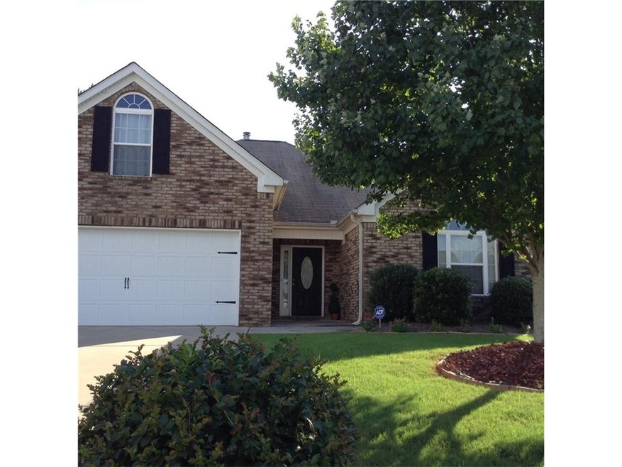4068 Village Crossing Cir, Ellenwood, GA 30294 - photo 1