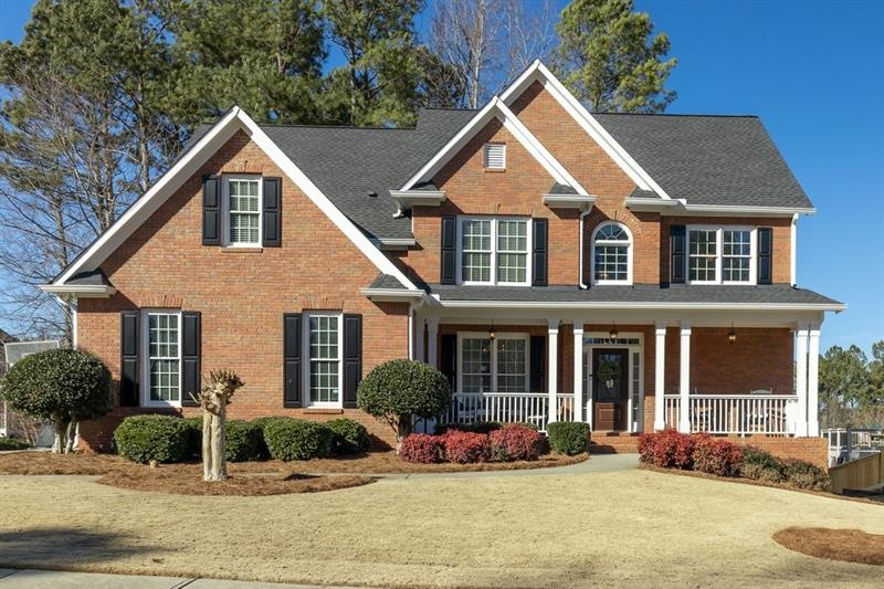 This beautiful five bedroom home is in the highly sought after community, The Georgian ~ Villa Rica.