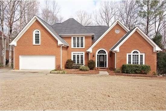 Welcome home to this 3 sided brick, 4 bedroom, mas