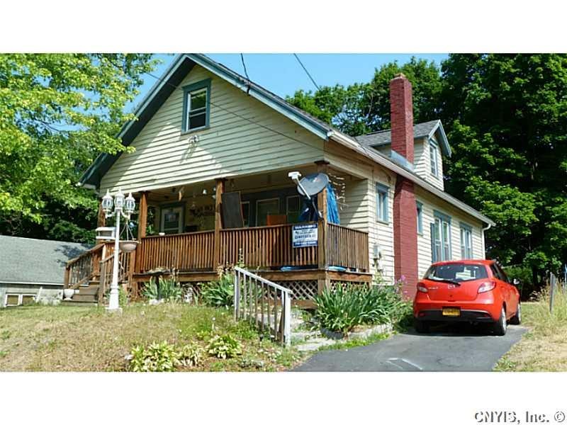 Exterior Front. Off-street black top driveway