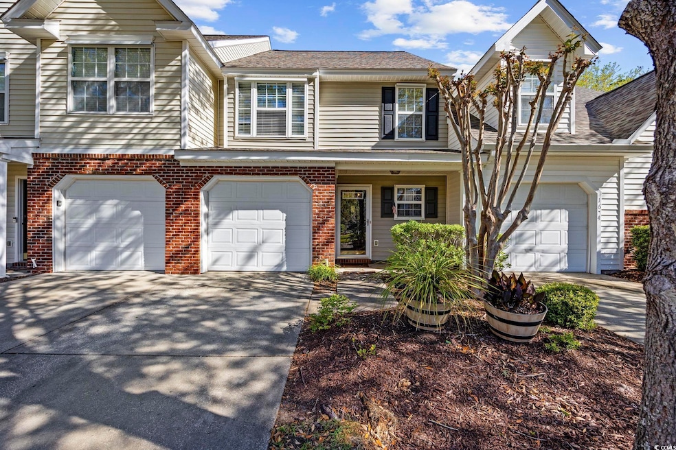 View of front of property featuring brick siding, 