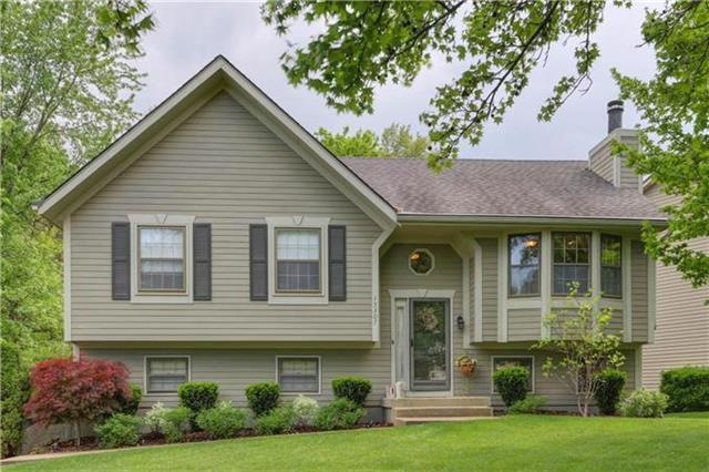 Meticulously maintained home has colorful landscap