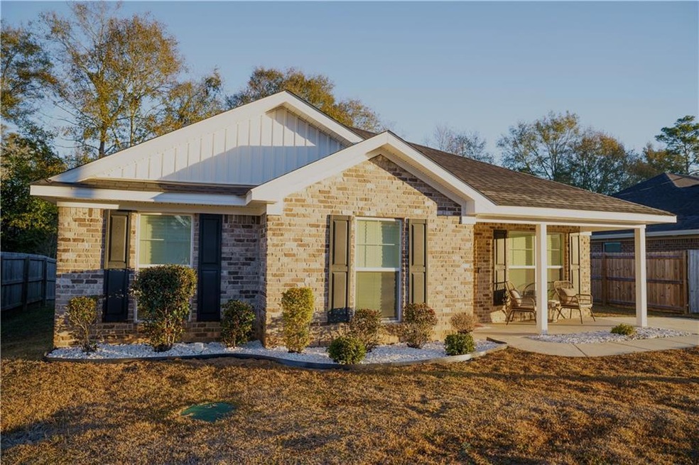 View of front of home featuring a patio