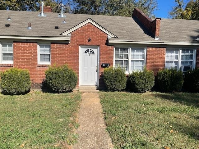 View of front of home with a front lawn