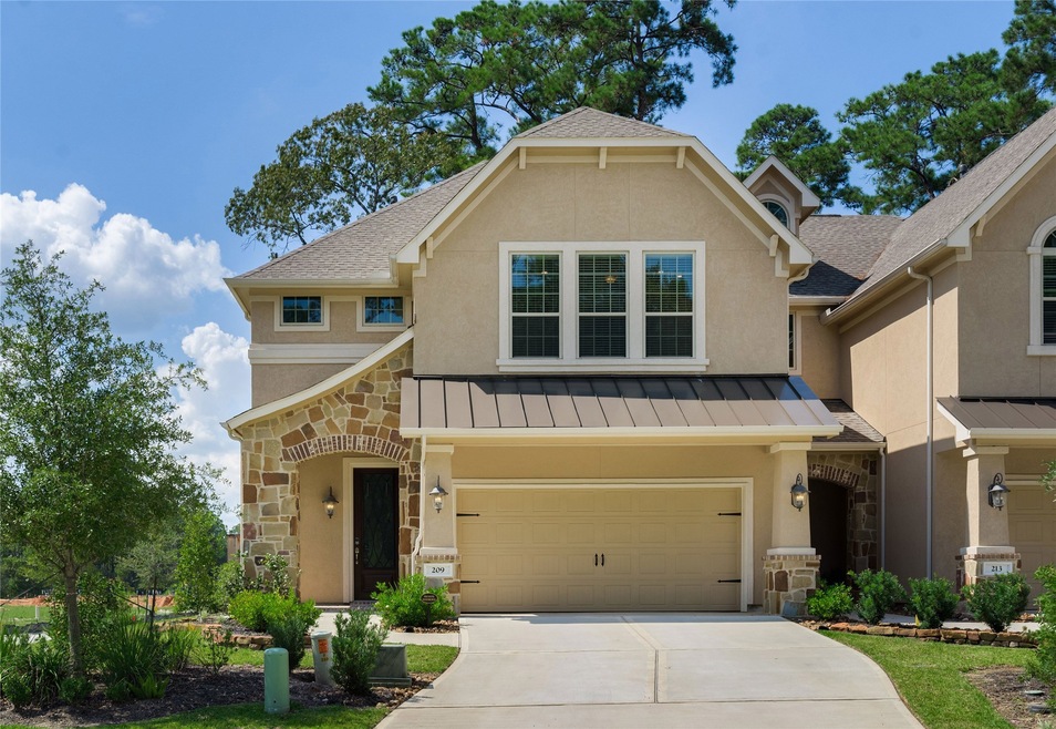 Welcome to this corner unit townhome!