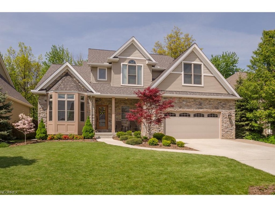 Stone Trimmed and Porch Front Elevation, Carriage 