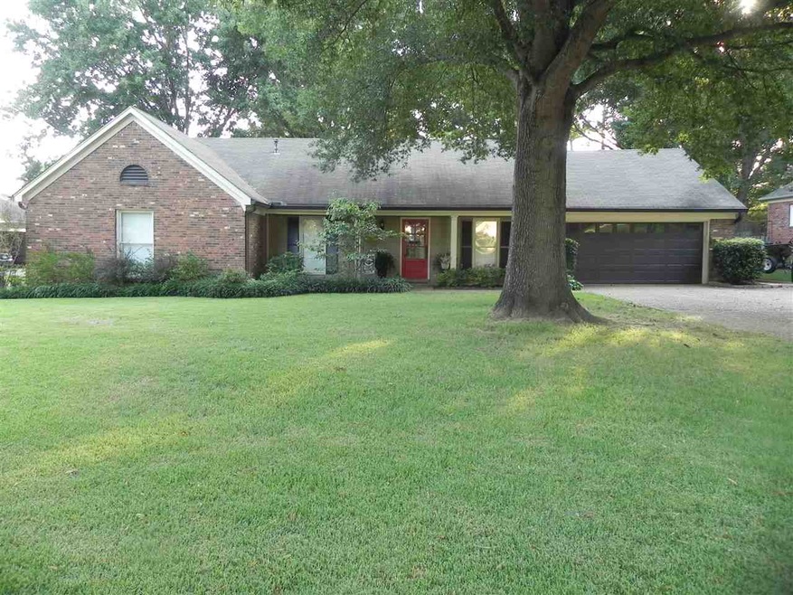 Home sits on a large lot with mature trees, double