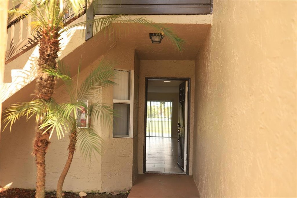 Private first floor entry. End unit
