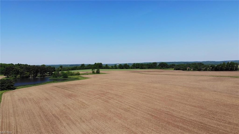 Fabulous acreage complete with lake, woods and the