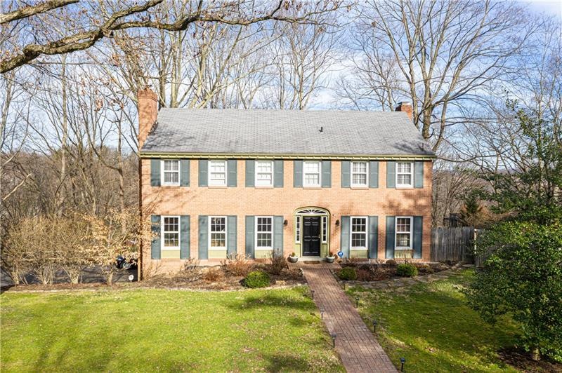 Welcome Home! This 4 bedroom, 3.5 bath brick Colon