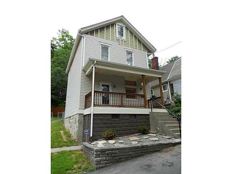 Exterior Front. Large 3 story home with nice large