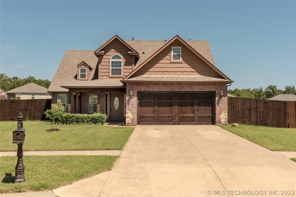 Gorgeous Home Features Wood Crafted Garage Door