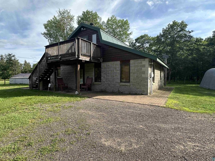 View of front of property with a deck and a front