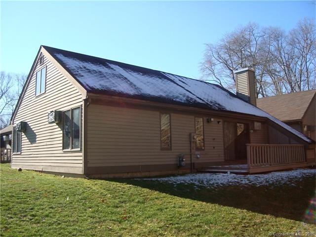 Detached condo with deck.