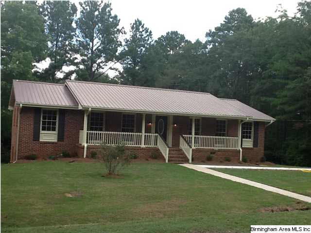 Brick home, metal roof and fabulously updated!