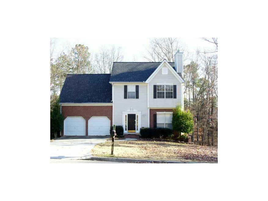 Exterior Front. House Front with Brick Details.