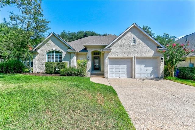 Front of home on fat pie shaped lot. House faces S