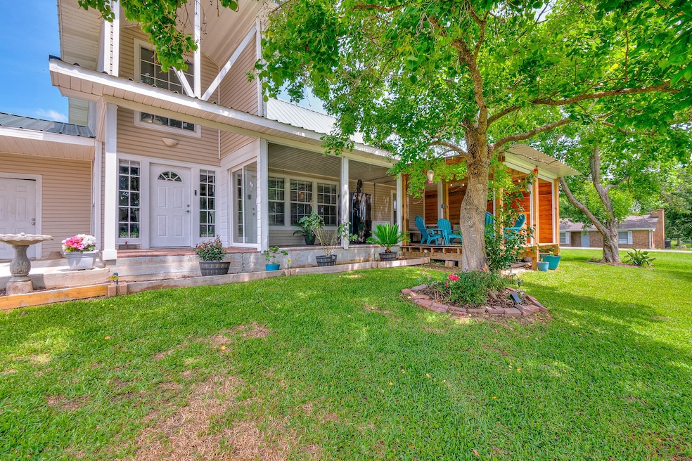 This charming home features a welcoming front porc