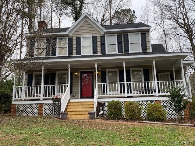 Front View featuring new vinyl siding, new steps, 