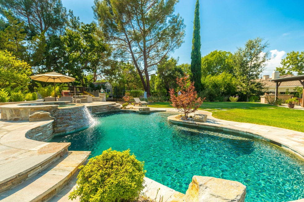 stunning pool with waterfall