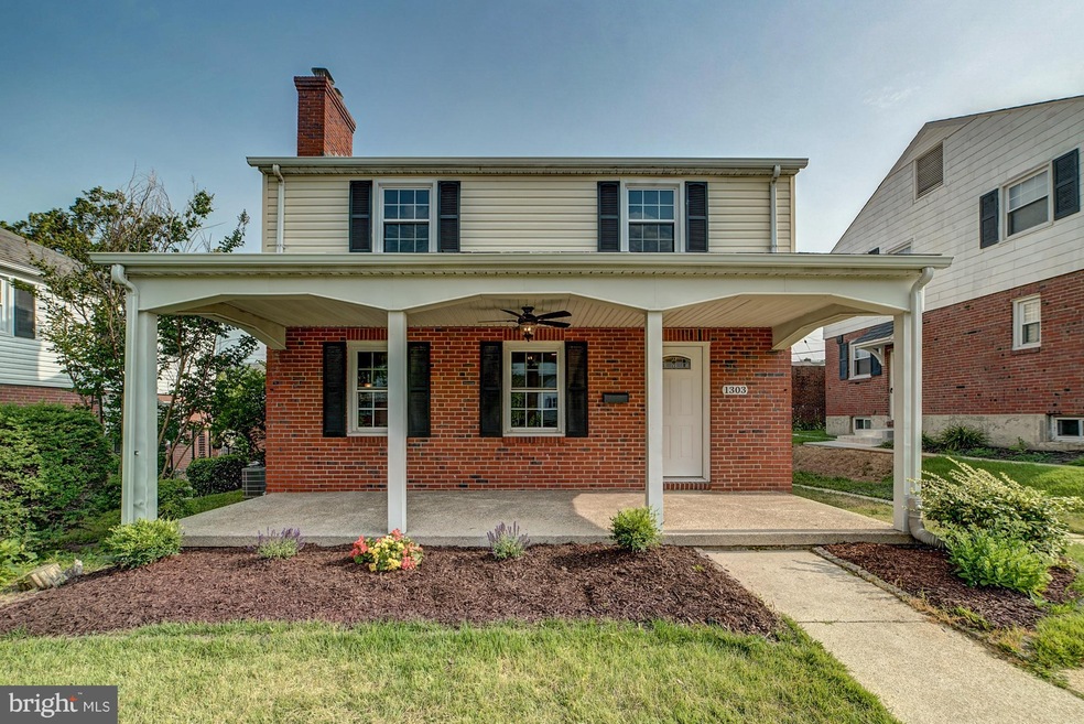 1303 E 36th St, Baltimore, MD 21218 - photo 1