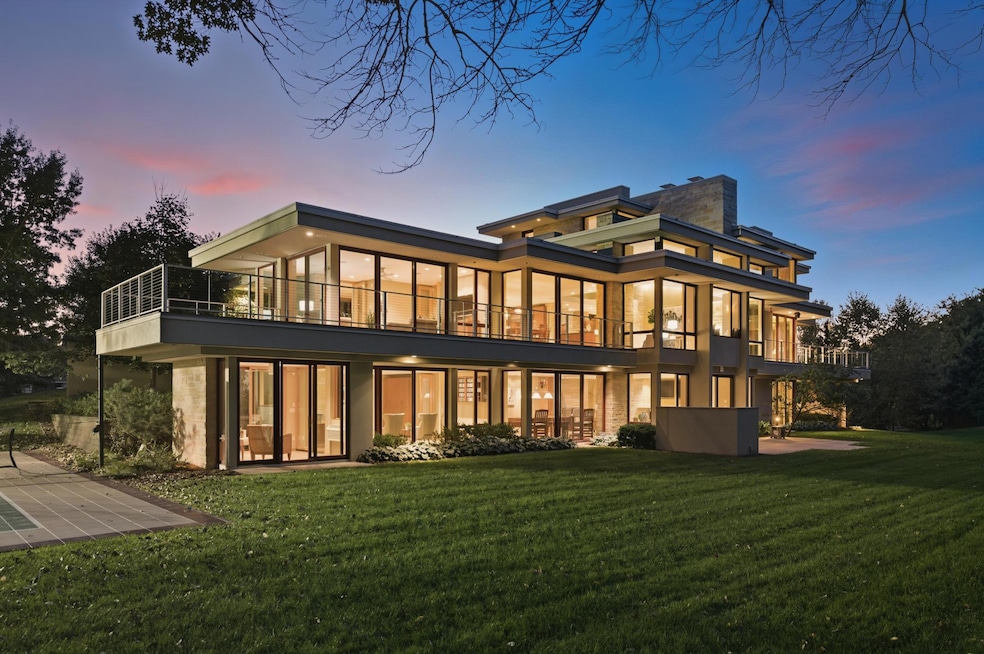 An elevation to behold in any light the panache shines!  The abundant nature of this acreage setting grants beautiful views & privacy. Large level backyard surrounded by trees. Cosmopolitan connections are easier here!