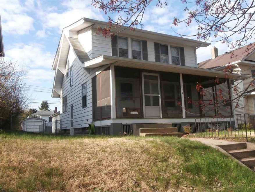 FRONT VIEW W/ SCREENED PORCH