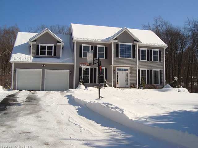 Exterior Front. Property is set back from road, wi