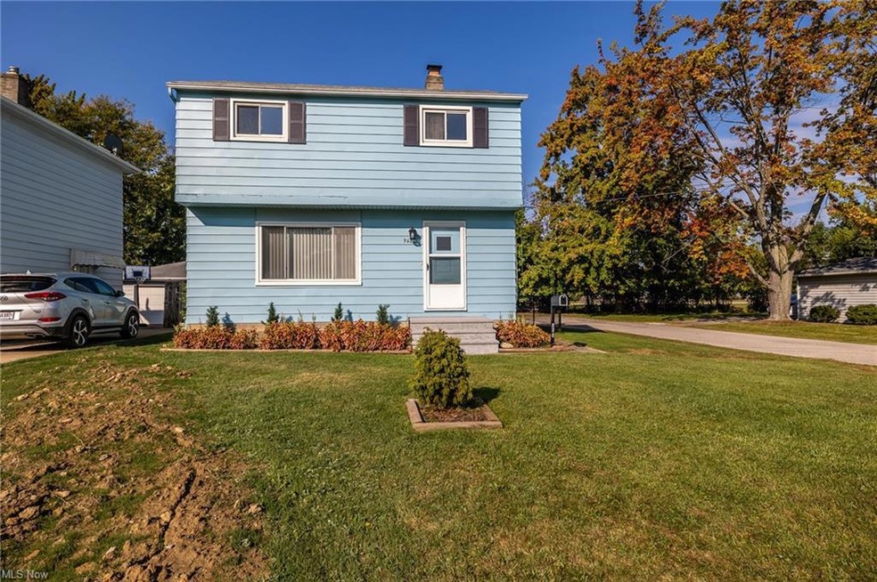 View of front of property with a front yard