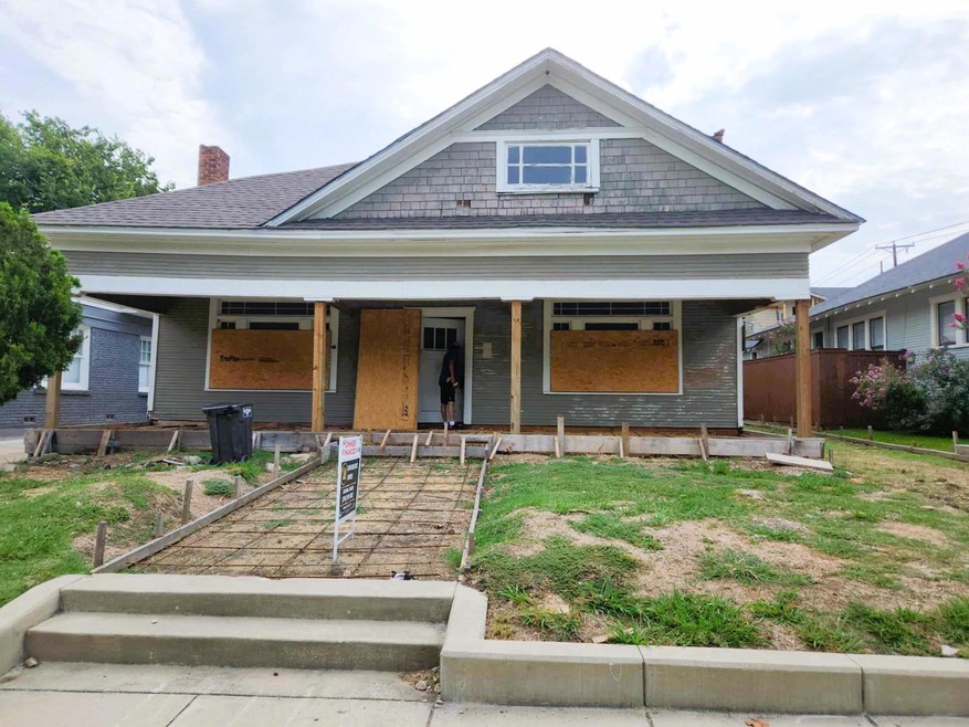 View of front of home featuring covered porch