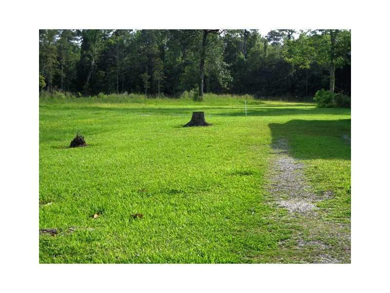 Land/Lot. View from road showing easement for driv