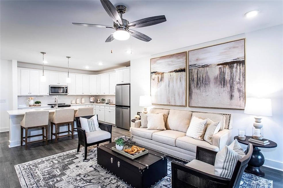 Spacious and Open - View of Family Room and Kitche